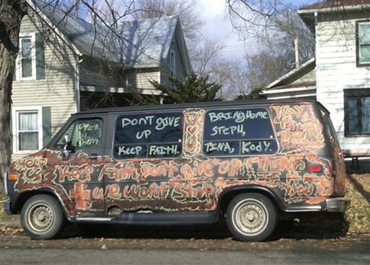 A spray painted van with messages to "Keep Faith", "Don't Give Up", "Pray 4 them" and "Bring Home Steph, Tina, Kody" is parked in Mount Vernon, Ohio on Wednesday, several days after 13-year-old Sarah Maynard was found bound and gagged in a basement. Search teams scoured vacant buildings and wooded areas for Maynard's mother, 32-year-old Tina Herrmann; Herrmann's 10-year-old son, Kody Maynard; and her 41-year-old friend, Stephanie Sprang. 